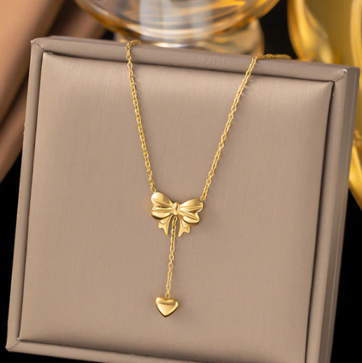Gold Plated Stainless Steel Anti Tarnish Heart Themed Bow inspired Pendant Necklace