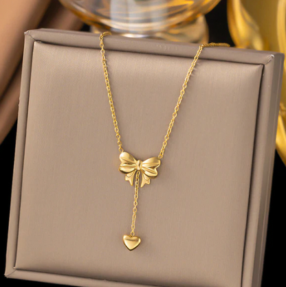 Gold Plated Stainless Steel Anti Tarnish Heart Themed Bow inspired Pendant Necklace
