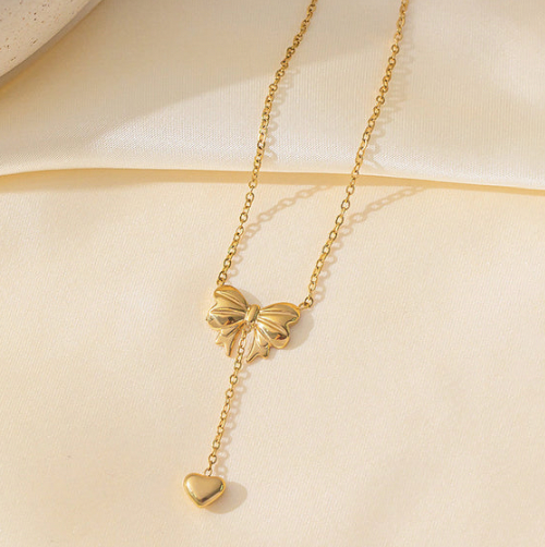 Gold Plated Stainless Steel Anti Tarnish Heart Themed Bow inspired Pendant Necklace
