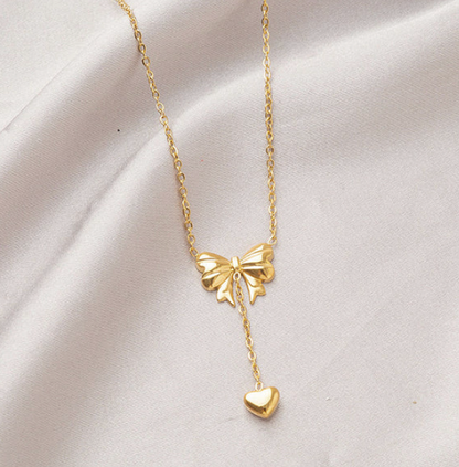 Gold Plated Stainless Steel Anti Tarnish Heart Themed Bow inspired Pendant Necklace