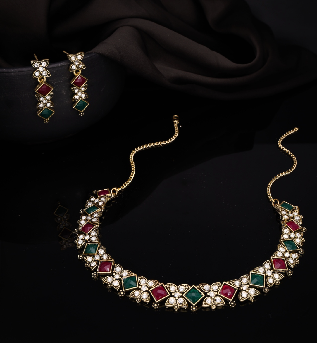 Gold Plated Stone Studded American Diamond Necklace Set.