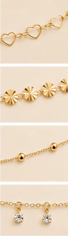 4-in-1 Layered Choker Necklace Set – Heart, Sunburst, Bead & CZ Drop