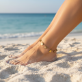 Coin stone anklet on beach