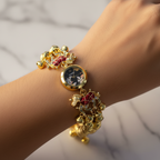 Bracelet watch with elephant charms on marble background
