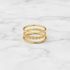 Gold Triple Band Daisy Chain Open Ring - white marble product shot
