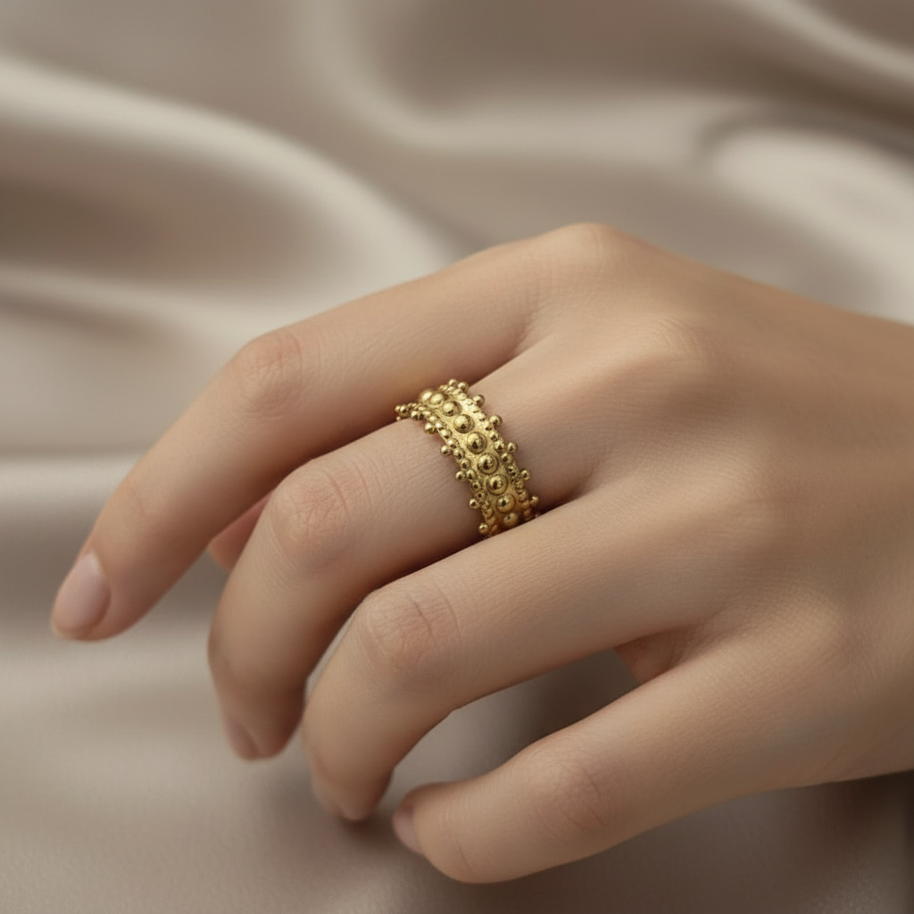 Gold Lace Beaded Crown Wide Band Open Ring - worn on finger beige background lifestyle shot