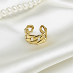 Gold Cuban Link Chain Open Cuff Ring - cream silk fabric close-up