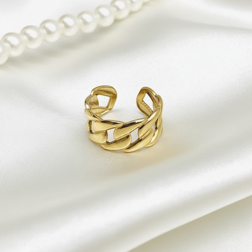 Gold Cuban Link Chain Open Cuff Ring - cream silk fabric close-up