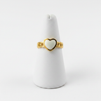 Gold chain link band white enamel heart open cuff ring on white jewelry stand, clean studio shot