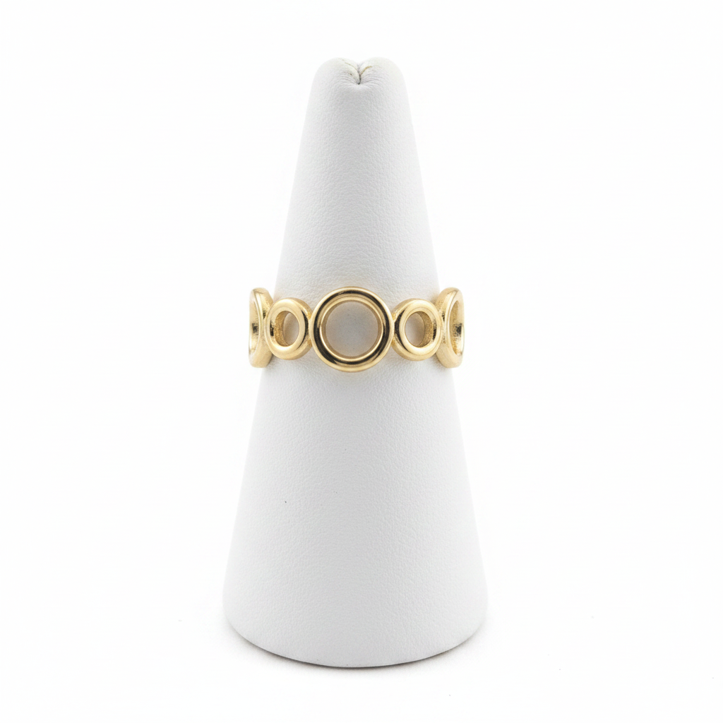 Gold open circle link band open cuff ring on white jewelry stand, clean studio shot
