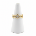 Gold open circle link band open cuff ring on white jewelry stand, clean studio shot