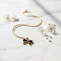Black & Gold Bow Pendant Necklace - Stainless Steel Gold Snake Chain