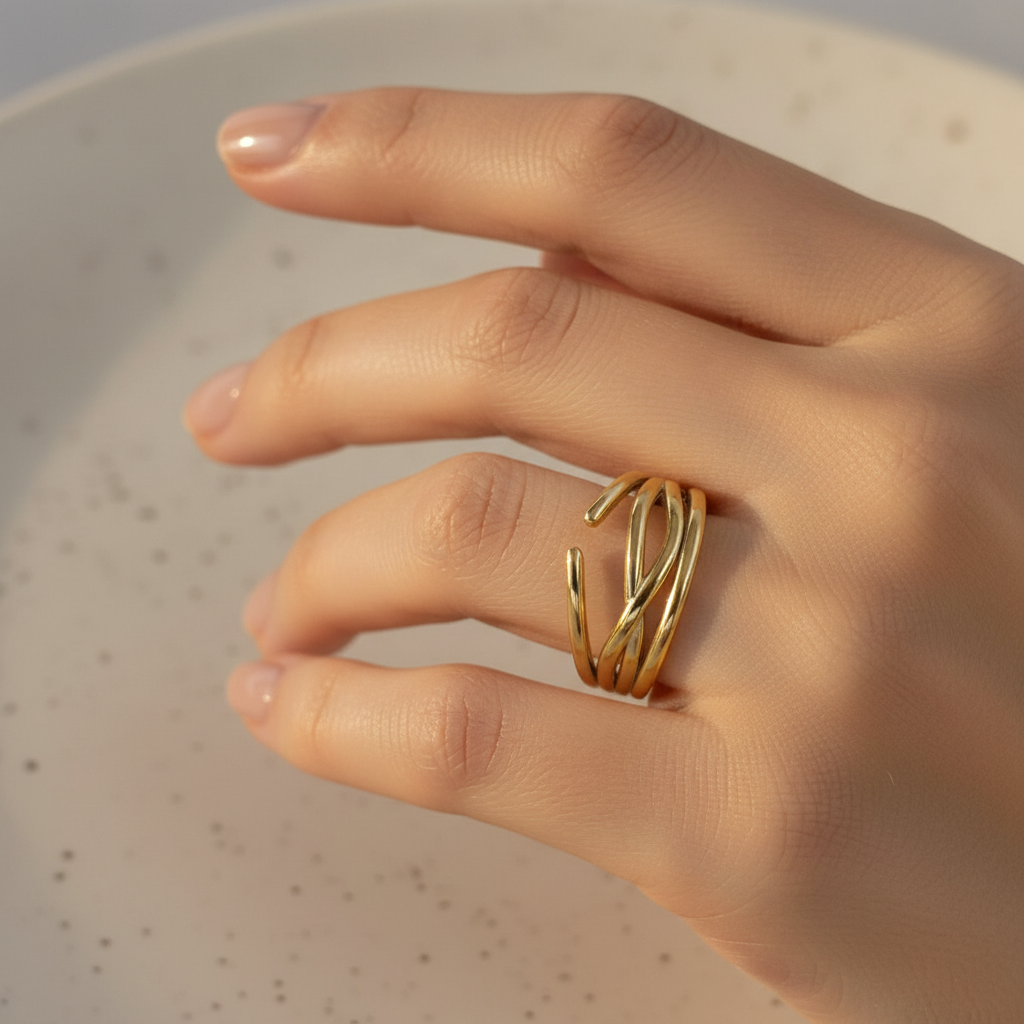 Gold Triple Wire Layered Open Cuff Ring - worn on finger cream background lifestyle shot