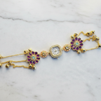 Purple Floral Charm Bracelet Watch – studio product shot