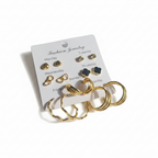 7-Pair Gold Earring Set - White Flat Lay