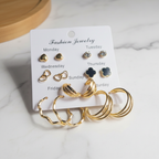 7-Pair Gold Earring Set - Marble Surface