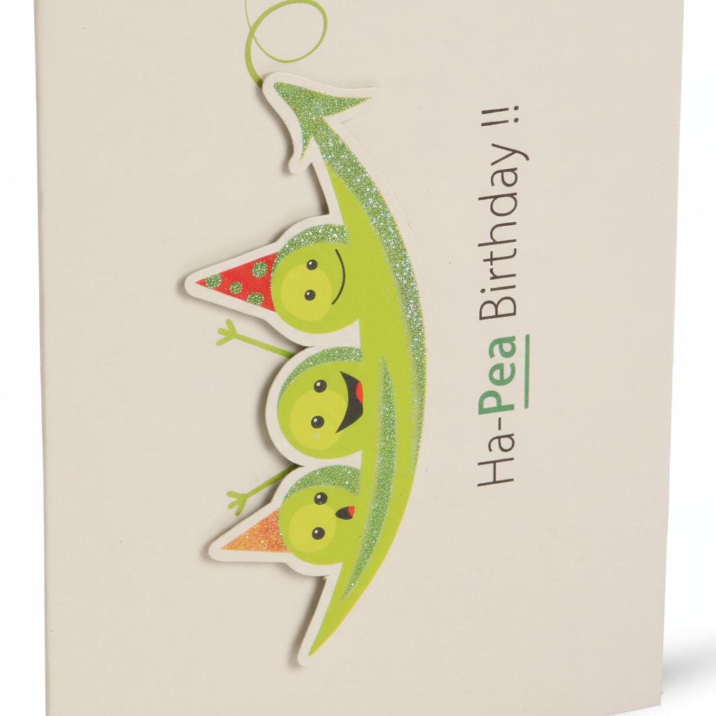 Close-up detail of 3D pea pod with party hats and glittery details