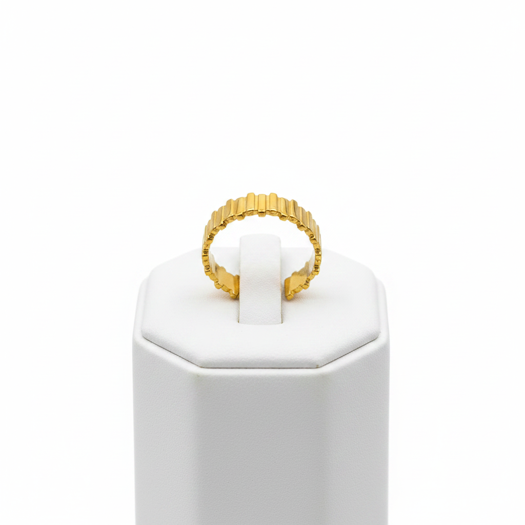 Gold vertical bar link wide band open cuff ring on white jewelry stand, clean studio shot