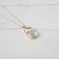 Gold Botanical Terrarium Cactus Moon Pendant Necklace - white marble flat lay product shot