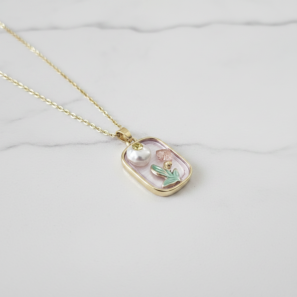 Gold Botanical Terrarium Cactus Moon Pendant Necklace - white marble flat lay product shot