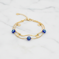Gold Double Layer Evil Eye & Coin Charm Bracelet - white marble product shot