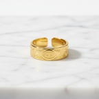 Gold Engraved Evil Eye Sunburst Wide Band Open Ring - white marble product shot