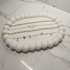 4-Piece Gold Bracelet Set - Marble Flat Lay