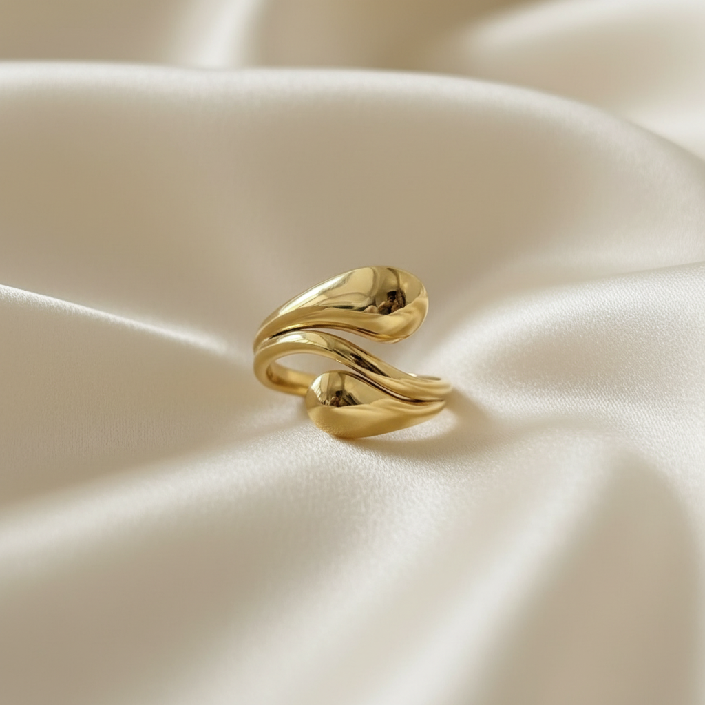 Gold Liquid Drop Wrap Open Ring - cream silk fabric close-up