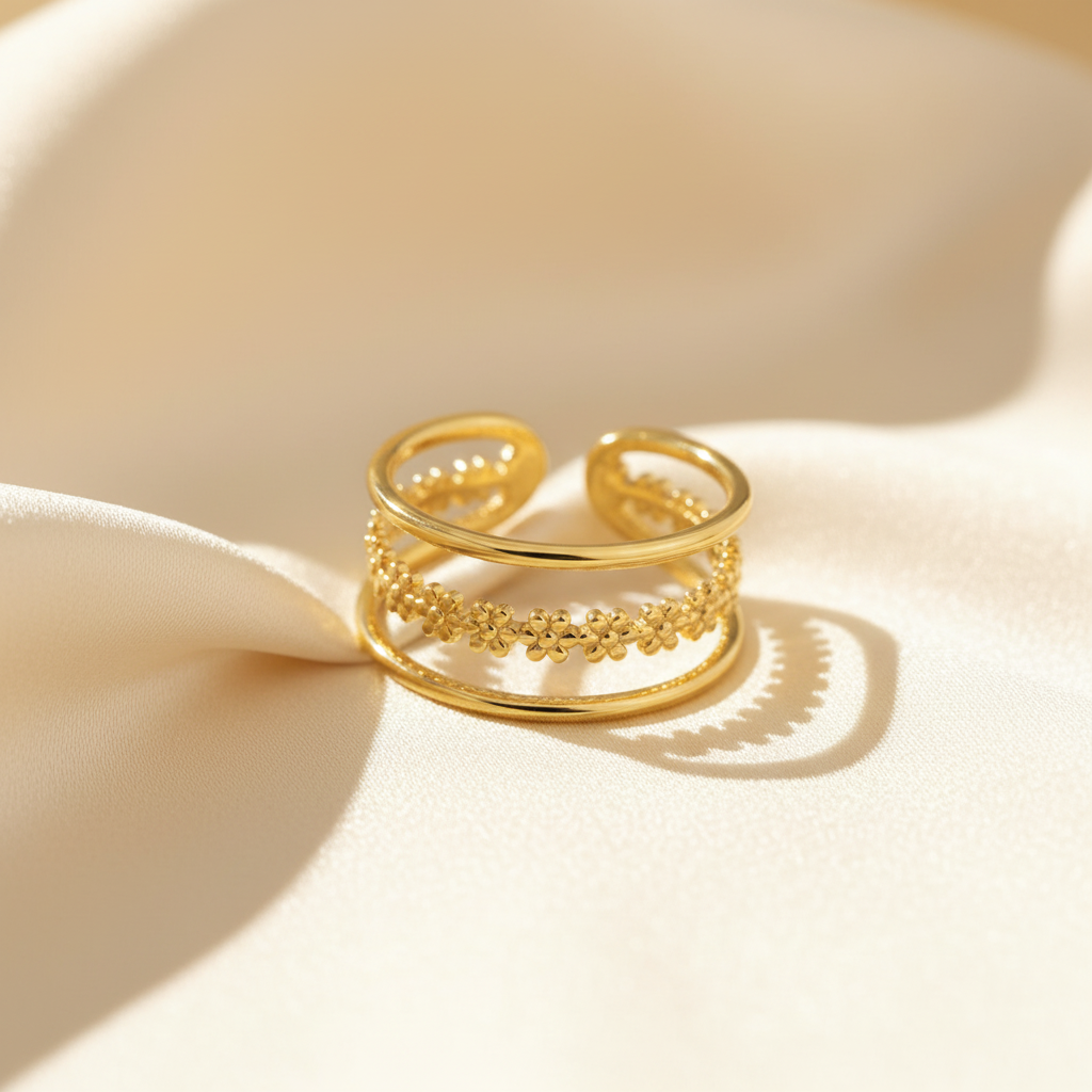 Gold Triple Band Daisy Chain Open Ring - cream silk fabric close-up