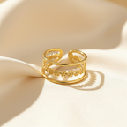 Gold Triple Band Daisy Chain Open Ring - cream silk fabric close-up