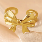 Gold Puffy 3D Bow Open Cuff Ring - cream silk fabric close-up