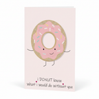 Close-up detail of pink donut character with glitter and sprinkles