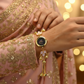 Pink opal bracelet watch on bridal sleeve