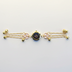 Pink opal bracelet watch flat lay