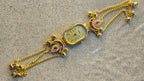 Peacock Charm Bracelet Watch Ruby Edition – detail view