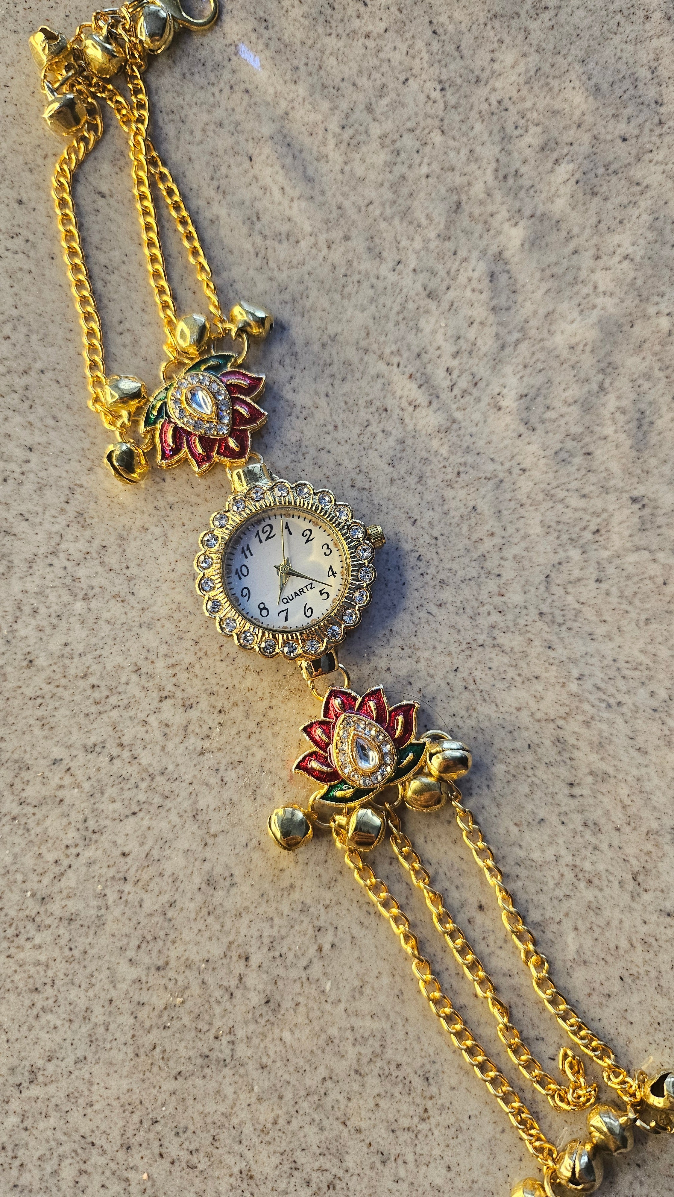 Lotus Charm Bracelet Watch – front view