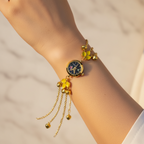 Yellow flower bracelet watch on marble background